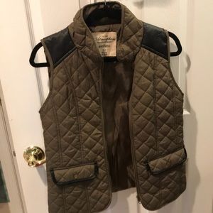 Green vest with black detailing